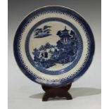 A late 18th century Chinese Boy on a Buffalo pattern dish, cell border, 24cm diam, c.1790