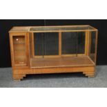 Industrial Salvage- An early 20th century oak haberdashery shop display cabinet/fitting, rectangular