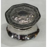A Middle Eastern silver box and cover, chased in the Islamic taste, calligraphy to base