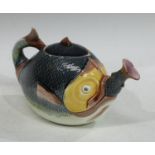 A late 19th century majolica teapot and cover, modelled as a fish, coloured glazes, unmarked, 18cm
