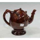 A 19th century Copeland & Garrett brown treacle glazed Cadogan ovoid teapot, impressed marks to