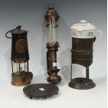 An Eccles miners lamp, type SL No.B120, 201; a GWR wall mounted oil lamp; a Sam L. Clarke's patent