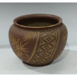 A late 19th century Langley Ware jardiniere, incised decoration on a brown ground, impressed marks