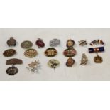 A collection military badges, For Rome And Country, etc
