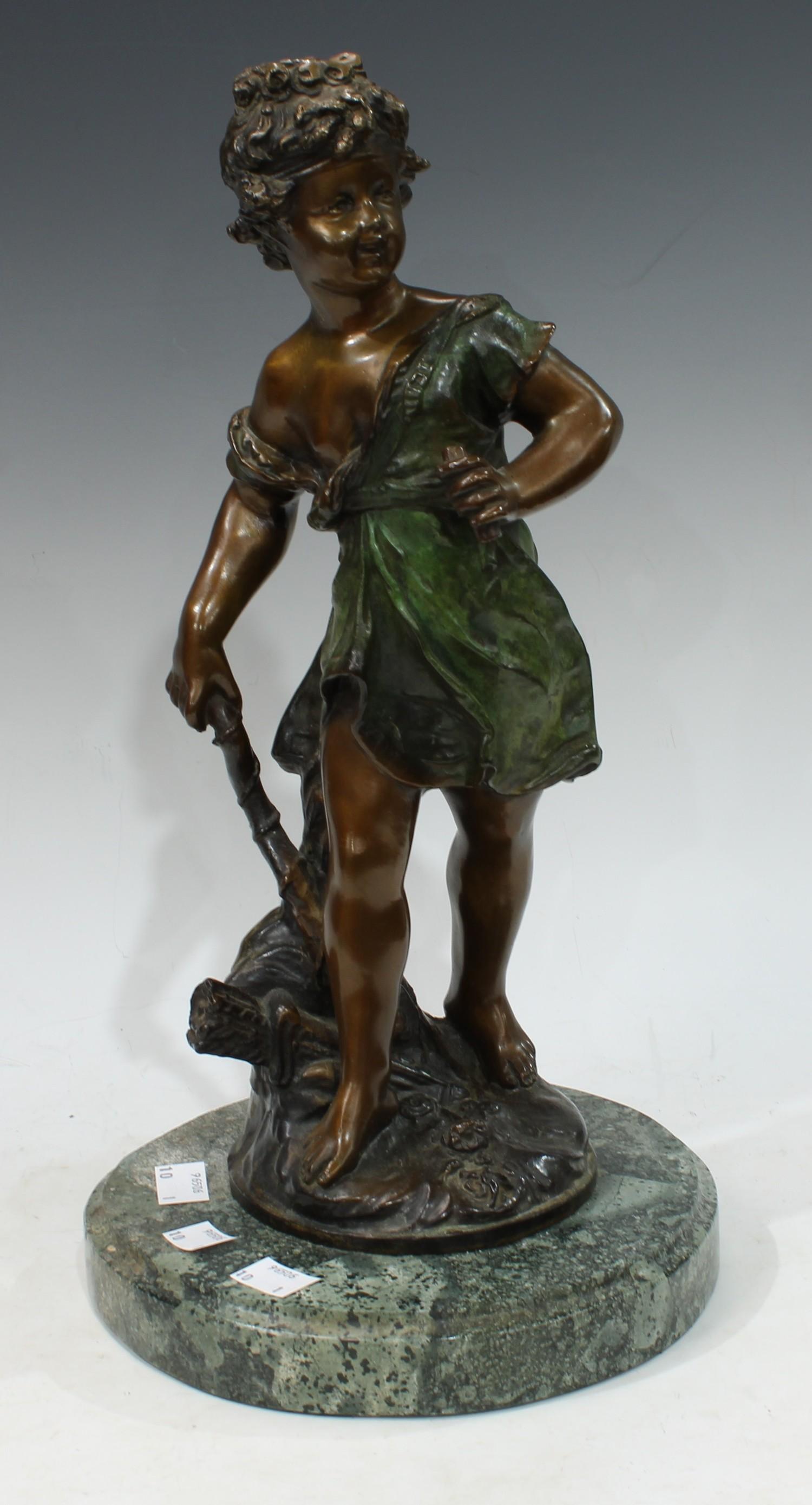 A bronze, Cupid, circular marble base, 40cm high, 19th century style