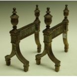 A pair of early 20th century andirons, urn finials, 18cm wide