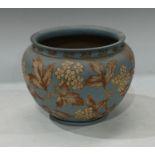 A late 19th century Langley Ware jardiniere, incised decoration on a pastel blue ground, impressed