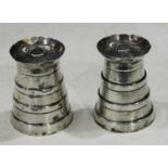 A pair of silver milk churn shaped table salt and pepper pot, Birmingham 1905, 5cm