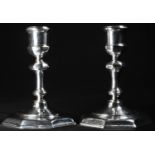 A pair of George I style cast silver candlesticks, knopped pillars, octagonal bases, 12cm high,