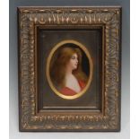 A Berlin KPM oval plaque, painted by Wagner, signed, Reflexion, with a Pre-Raphaelite beauty, she