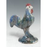 A Denby cockerel money box, mottled blue and green glaze, inscribed Rosa Smith, 20cm high