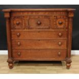 A Victorian Scottish mahogany chest, inverted break-centre top above a 'bonnet' drawer flanked by