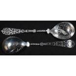 A pair of Victorian Aesthetic Movement silver serving spoons, each bowl well engraved with