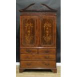 A 19th century mahogany and marquetry linen press, dentil cornice above a deep frieze applied with