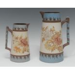 A Langley Ware Aesthetic Movement spreading cylindrical jug, incised with chrysanthemums and