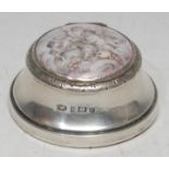 A late Victorian lady's silver and enamel rouge pot, the domed cover with an inset enamel plaque