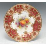 A Royal Worcester shaped circular plate, painted by Albert Shuck, signed, with ripe plums and