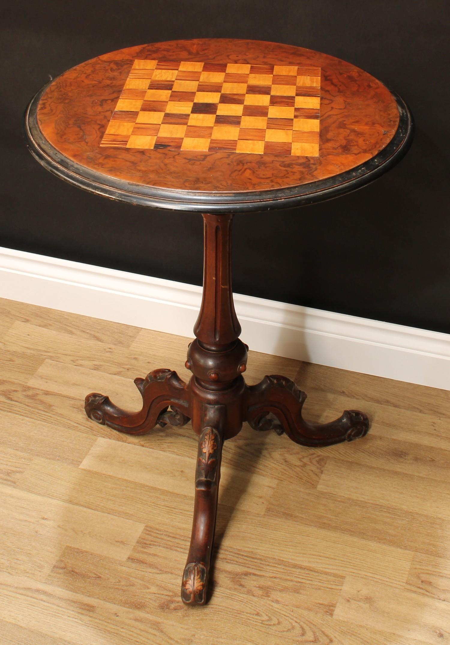 A Victorian walnut tripod games table, circular top inlaid for chess, turned and fluted pillar, - Image 2 of 2