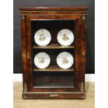 A Victorian gilt metal mounted walnut pier cabinet, rectangular top above a glazed door, plinth