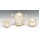 A Royal Worcester rare moulded ivory and gilt three piece coffee set, picked out in gilt, 22.5cm