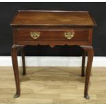A 19th century Irish mahogany and oak silver table, rectangular top with shallow gallery above a