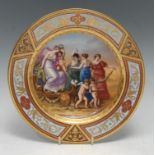 A Vienna circular plate, The Triumph of Venus, within chevron tooled gilding, the rim with