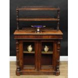 A Victorian walnut pier cabinet, rounded rectangular superstructure with two shelves, flanked by