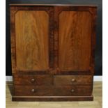 A 19th century mahogany dwarf linen press, 160cm high, 138cm wide, c. 1870