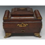 A Regency tooled and gilt morocco leather sarcophagus work box, hinged cover enclosing a fitted