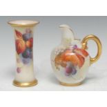 A Royal Worcester flat sided jug, decorated with autumn leaves, reeded gilt loop handle, 13cm