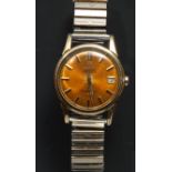 A gentleman's Omega Constellation Automatic Chronograph wrist watch, golden dial, baton