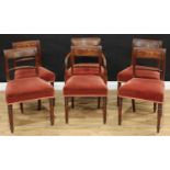 A set of six Regency mahogany bar back dining chairs, comprising five side chairs and a carver,