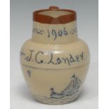 A Denby jug, incised in blue, J G Lander, 1906 above sailing boat and reeds, picked out in blue,