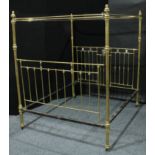 A 19th century brass four poster bed, knop finials, the ends inlaid with tesserae, 231cm high, 216cm