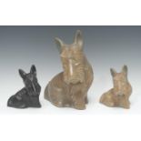 A Langley Mill Oakes period stoneware Scottie dog, in tan, 24cm high, c.1938; another, smaller, 15cm