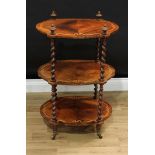A Victorian walnut and marquetry shaped oval three-tier whatnot, by Holland & Sons, London,