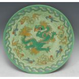 A Crown Ducal Charlotte Rhead Manchu Dragon pattern circular plate, tube lined with dragon and