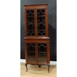 An Edwardian satinwood crossbanded mahogany corner display cabinet, stepped cornice above a pair