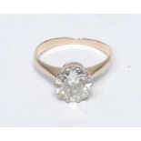 A diamond solitaire ring, round brilliant cut diamond approx 1.5ct, white metal crown claw set,