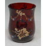 A 19th century Bohemian beaker, waisted, enamelled with colourful flower swags, 10cm high, c.1890