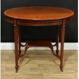 An Edwardian satinwood crossbanded mahogany oval centre table, oversailing top above a deep