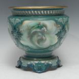 A Hadley's Worcester jardiniere, moulded in relief with four panels each painted with fish, in tones