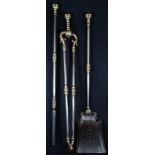 A set of George III steel and brass fire irons, comprising shovel, tongs and poker, knop finials,