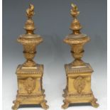 A pair of 19th century gilt brass andirons, flame finials, pedestal bases, 44cm high, c.1870