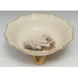 A Royal Worcester footed circular dish, in the manner of Baldwin, with swans on a blush ivory