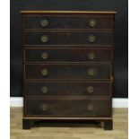 A 19th century laburnum chest, rectangular top above three long double-depth drawers, brass ring