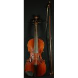 A violin, the two-piece back 36cm long excluding button, paper label, The Maidstone, John G