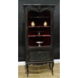 A late Victorian ebonised vitrine, in the Louis XV Revival taste, moulded top above a rectangular