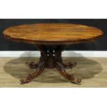 A Victorian rosewood shaped oval centre table, well figured top with matched veneers above a deep