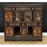 A Chinese hardwood and mother of pearl marquetry side cabinet, moulded cornice above an
